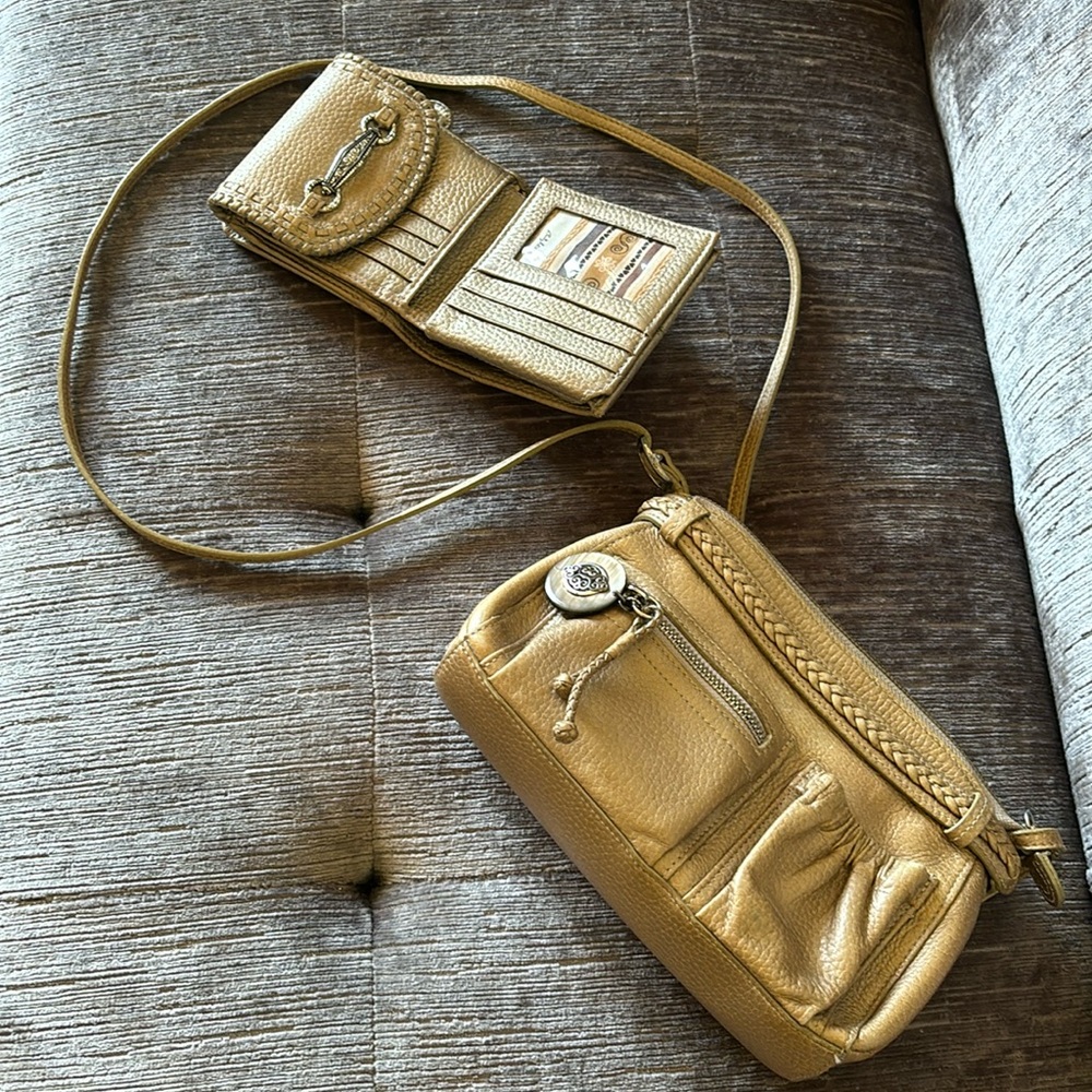 Brighton crossbody purse with many sections and zippers. And matching wallet.